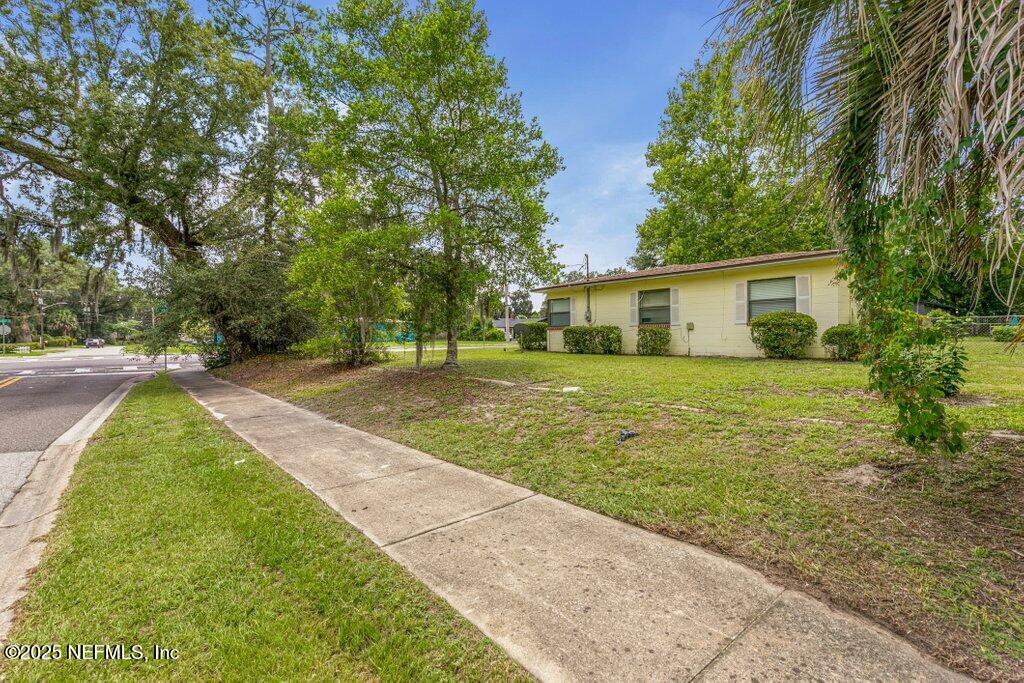 2305 Broward Road Jacksonville, FL 32218 - Photo 29 of 30 a view of a backyard with large trees