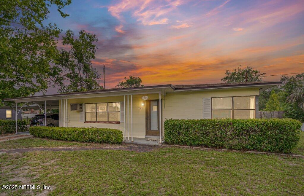 2305 Broward Road Jacksonville, FL 32218 - Photo 5 of 30 a front view of a house with a garden