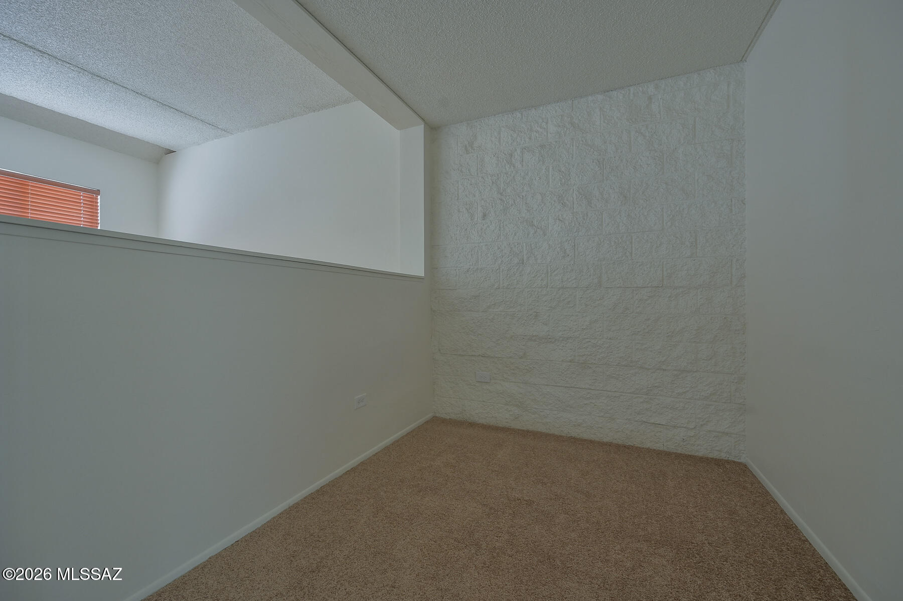 7777 East Golf Links Road, Unit 2308 Tucson, AZ 85730 - Photo 20 of 37 close up of a white marble wall