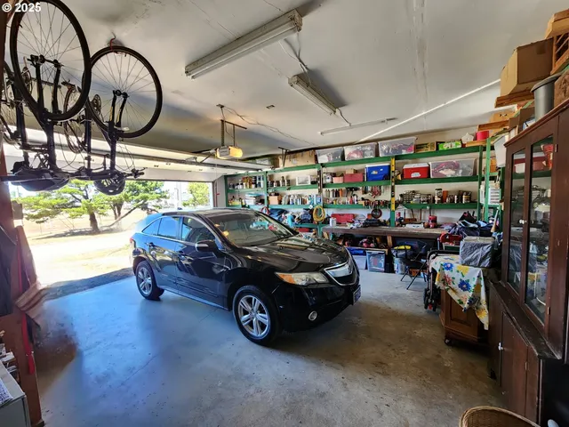 a flower pot with wooden fence