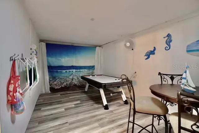 a view of a park with large trees