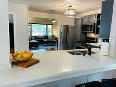 a room with furniture and a flat screen tv