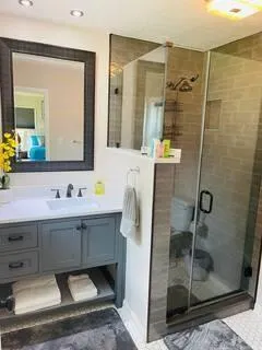 a bathroom with a sink and a mirror