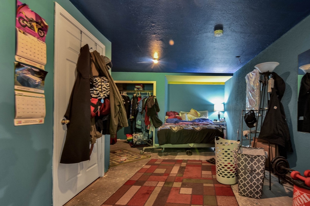 110 Harper Ridge Road Hampstead, NH 03826 - Photo 27 of 32 a walk in closet with clothes and shoes
