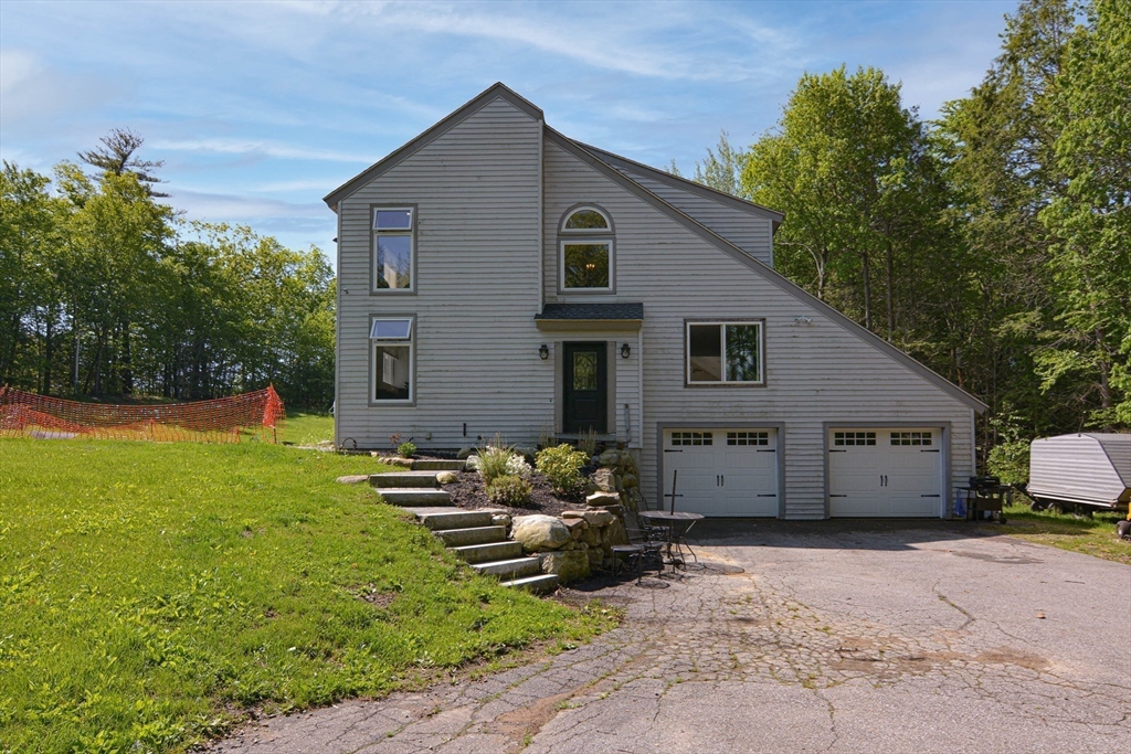 110 Harper Ridge Road Hampstead, NH 03826 - Photo 28 of 32 a view of a house with backyard