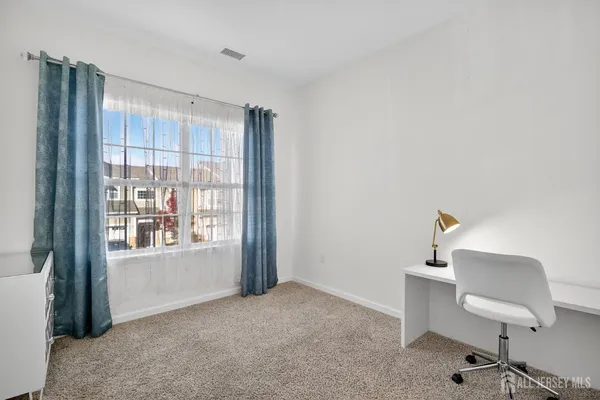 wooden floor and window in a room