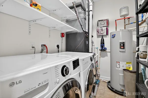 a sign that is sitting in front of flowers