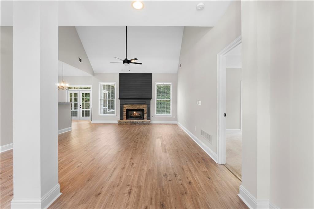 65 Riverwood View Dallas, GA 30157 - Photo 2 of 11 a view of main area with wooden floor fireplace