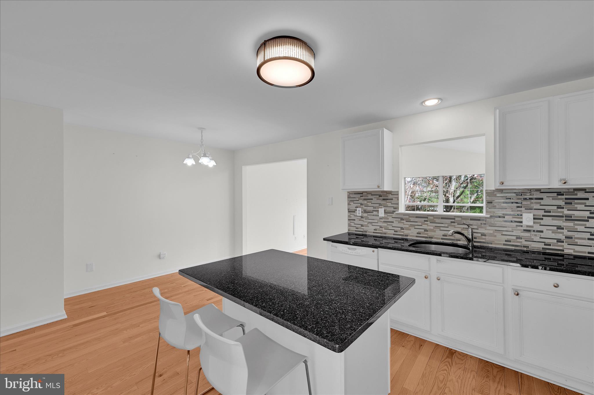 169 Judy Way Aston, PA 19014 - Photo 14 of 43 a kitchen with a sink cabinets and window