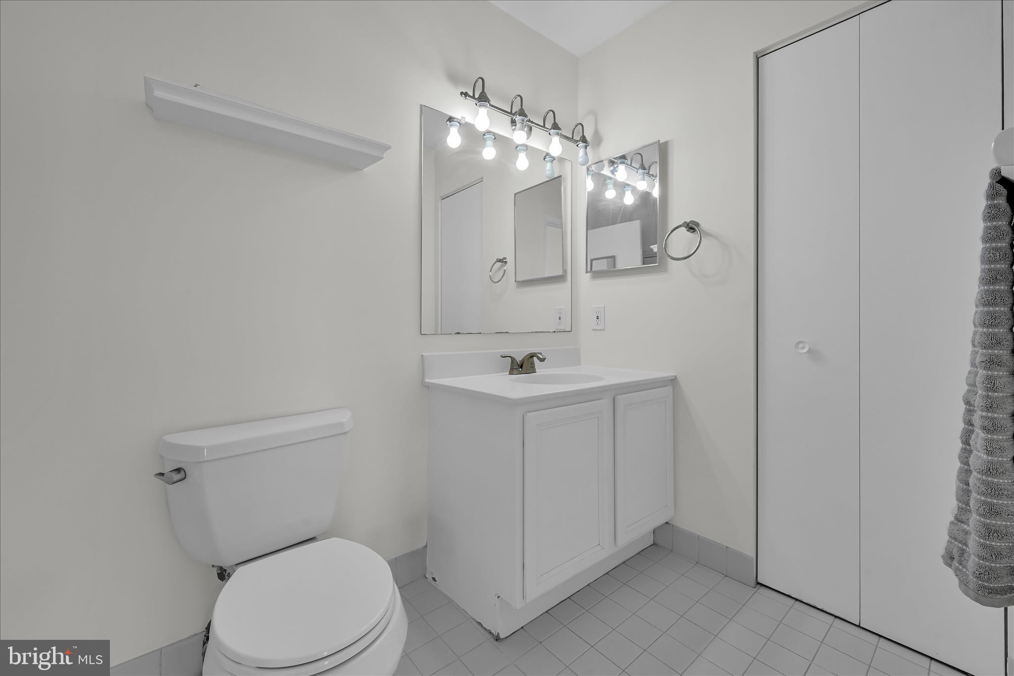 169 Judy Way Aston, PA 19014 - Photo 23 of 43 a bathroom with a sink a toilet and mirror