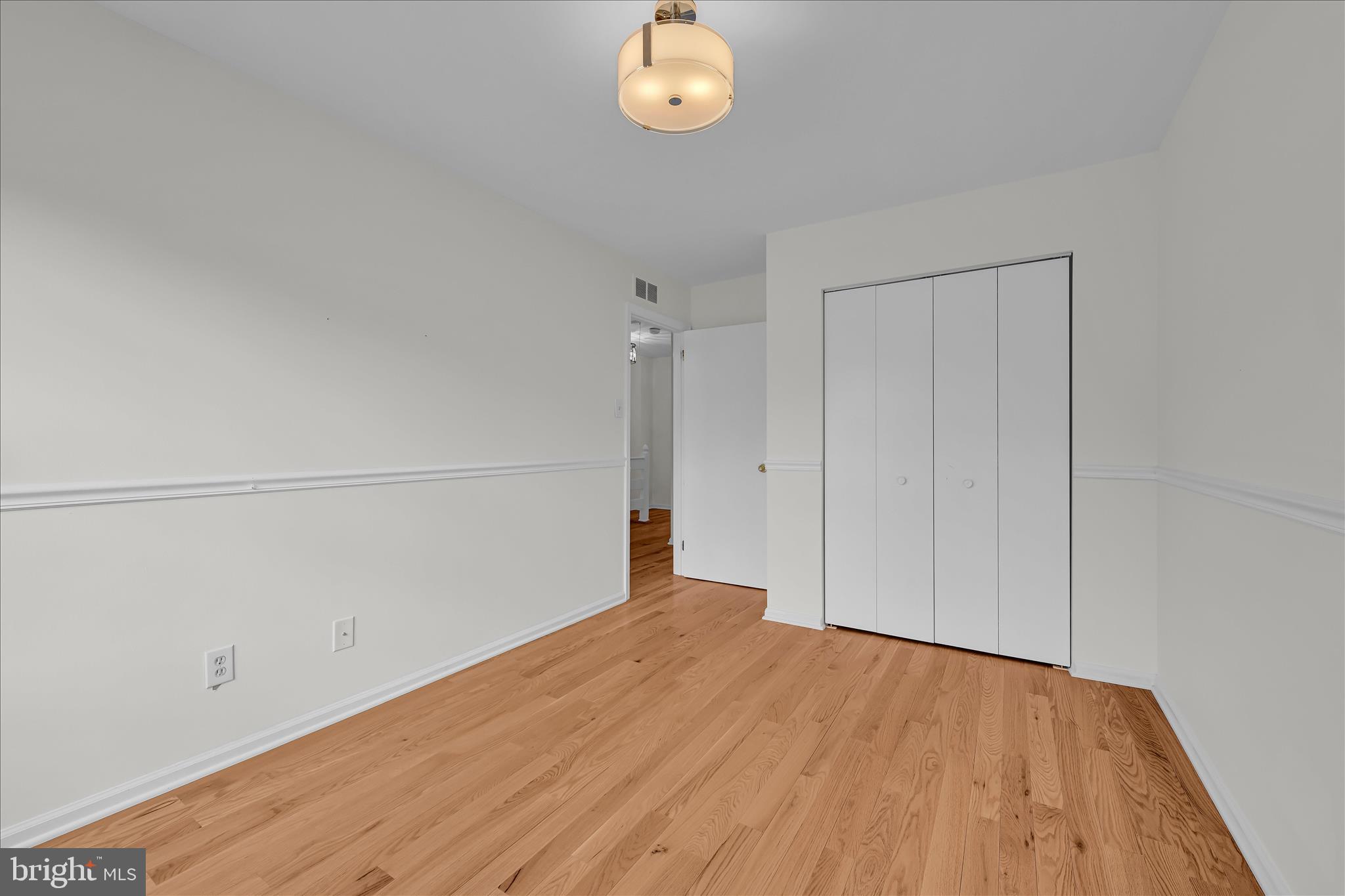 169 Judy Way Aston, PA 19014 - Photo 26 of 43 a view of empty room with wooden floor