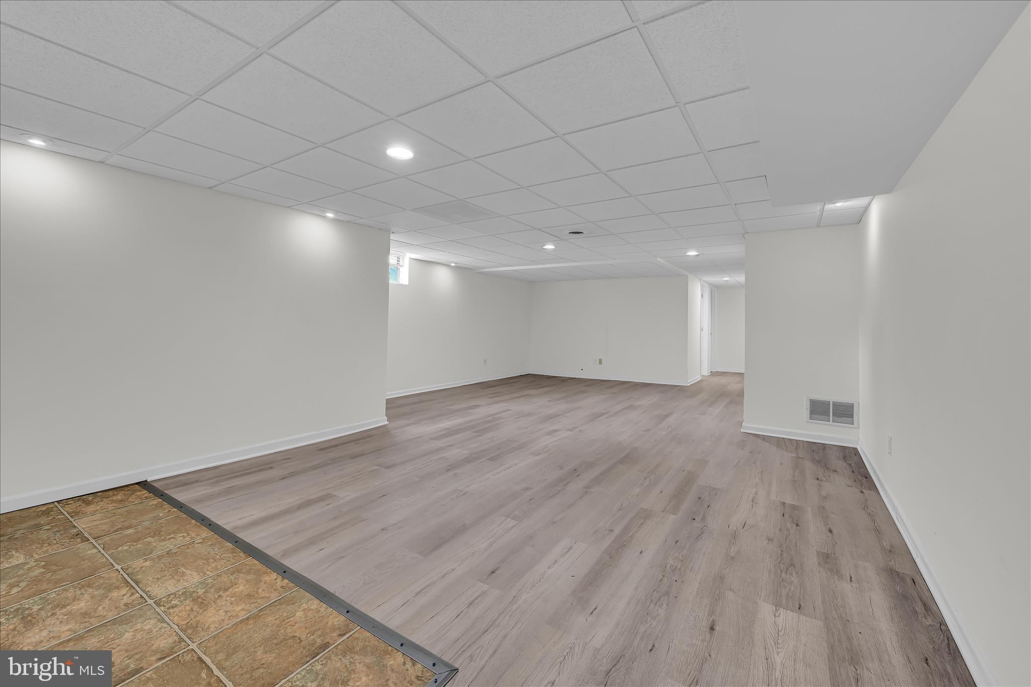 169 Judy Way Aston, PA 19014 - Photo 35 of 43 a view of empty room with wooden floor