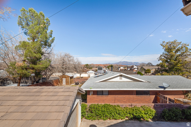 892 Cambridge Drive St. George, UT 84770 - Photo 56 of 65 Terracotta-toned tile roofline with a distinct gable design