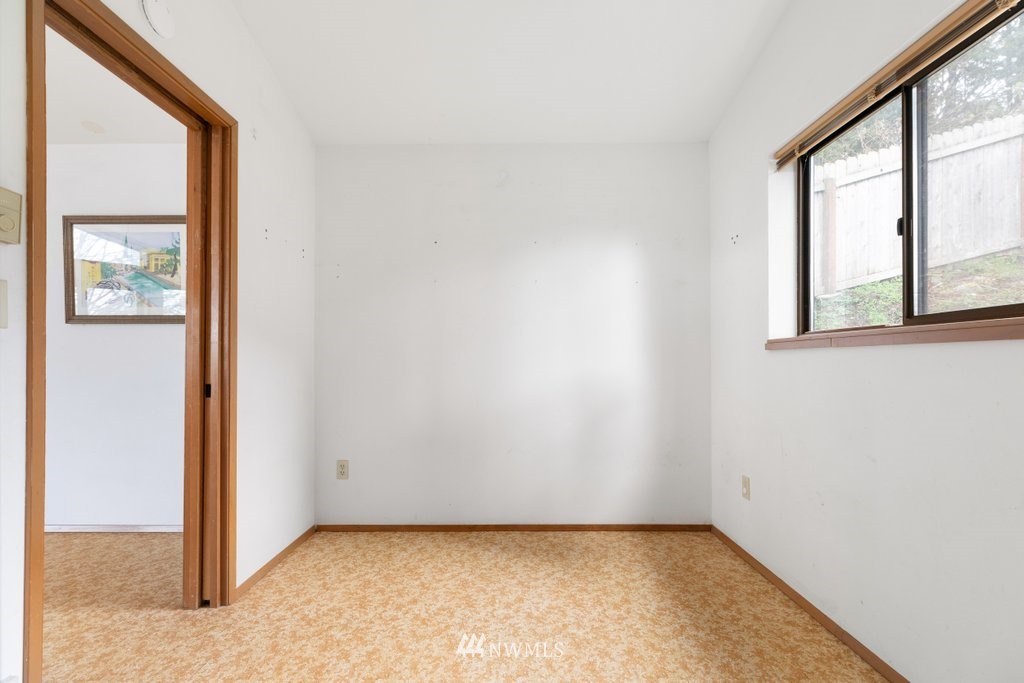 3769 Periwinkle Road Clinton, WA 98236 - Photo 15 of 29 an empty room with windows