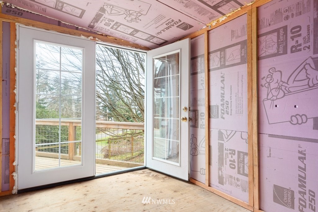 3769 Periwinkle Road Clinton, WA 98236 - Photo 18 of 29 a view of an empty room with a window