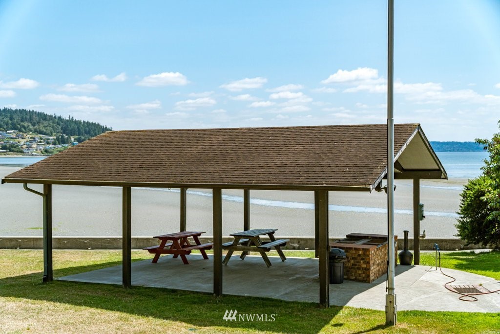 3769 Periwinkle Road Clinton, WA 98236 - Photo 29 of 29 a view of a garden with sitting area