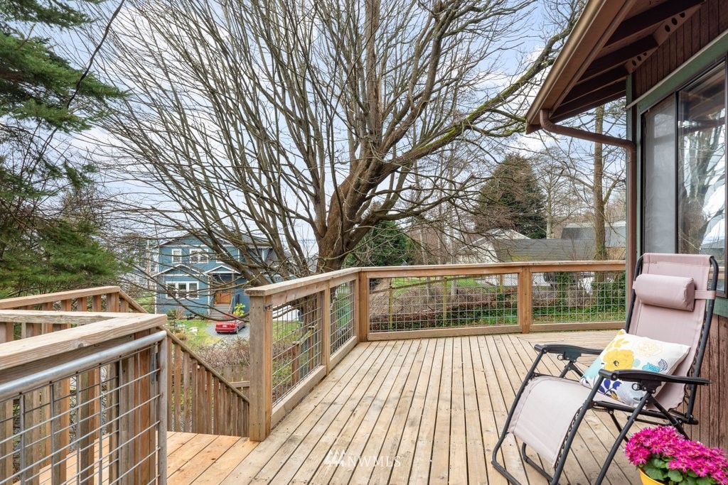 3769 Periwinkle Road Clinton, WA 98236 - Photo 3 of 29 a view of a chairs and tables in the balcony