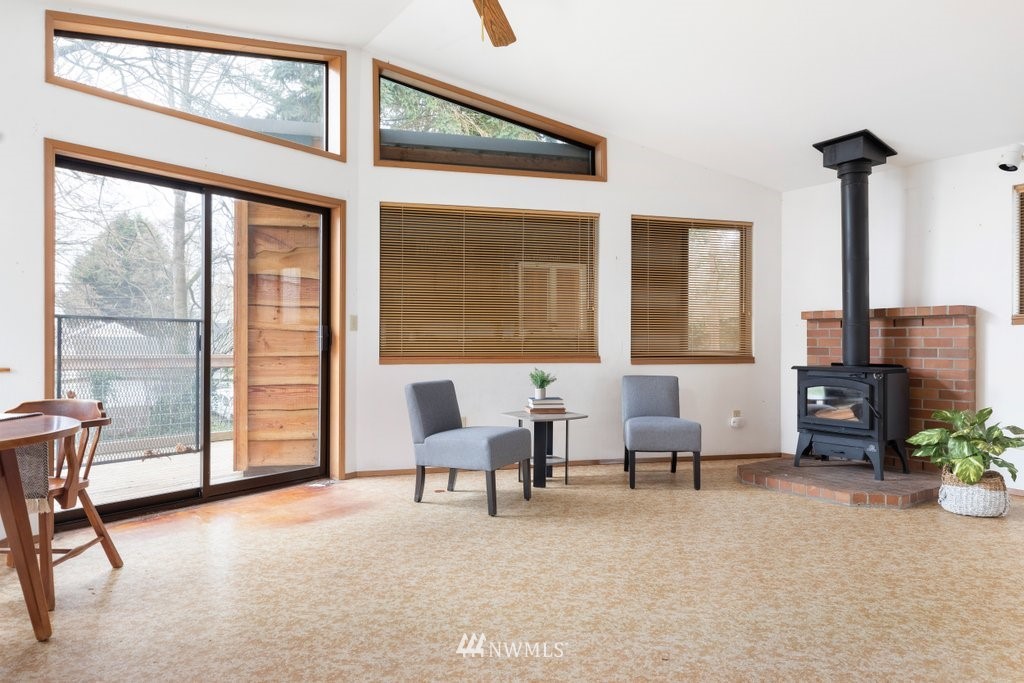 3769 Periwinkle Road Clinton, WA 98236 - Photo 7 of 29 a living room with furniture and a window