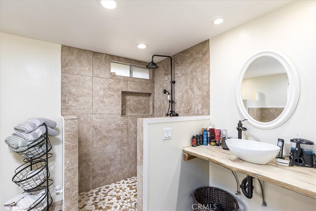 44000 Sandstone Road Aguanga, CA 92536 - Photo 14 of 31 a bathroom with a sink and a mirror