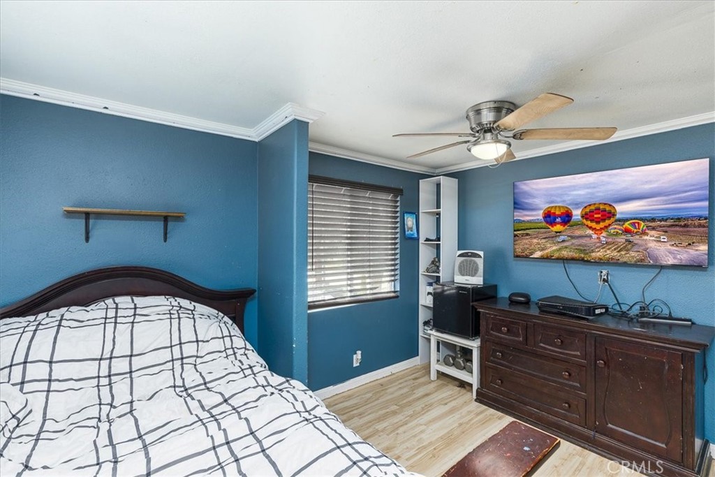 44000 Sandstone Road Aguanga, CA 92536 - Photo 18 of 31 a bedroom with furniture and window