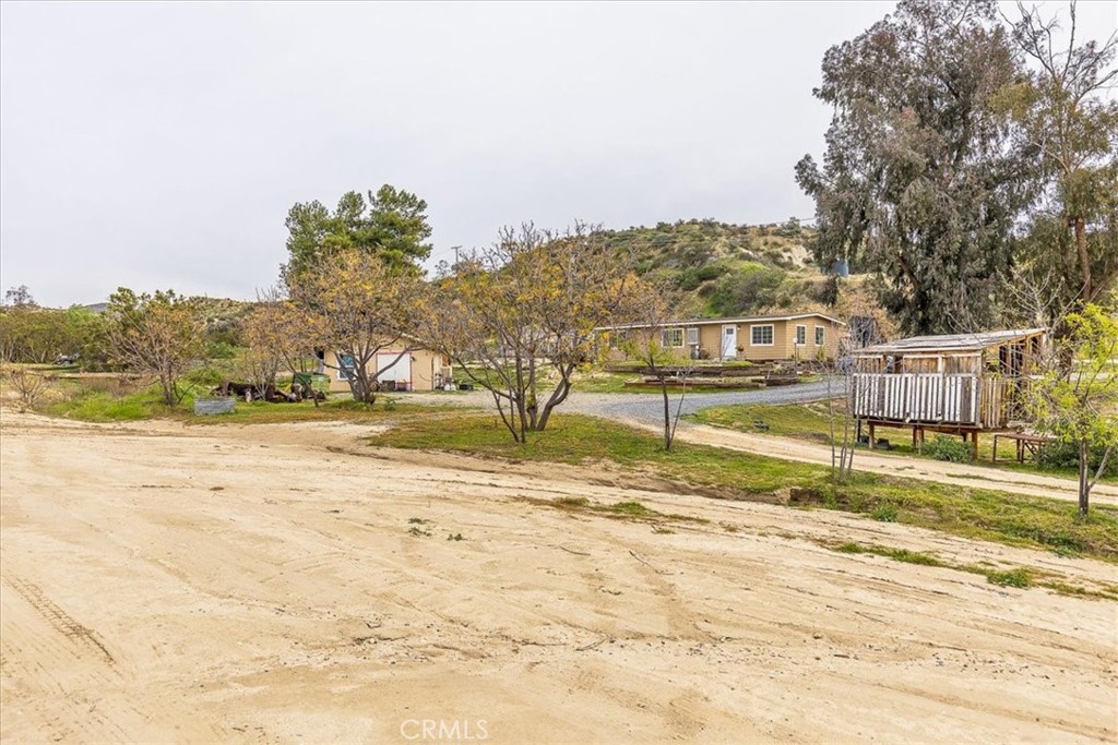 44000 Sandstone Road Aguanga, CA 92536 - Photo 25 of 31 a view of a yard with an outdoor space