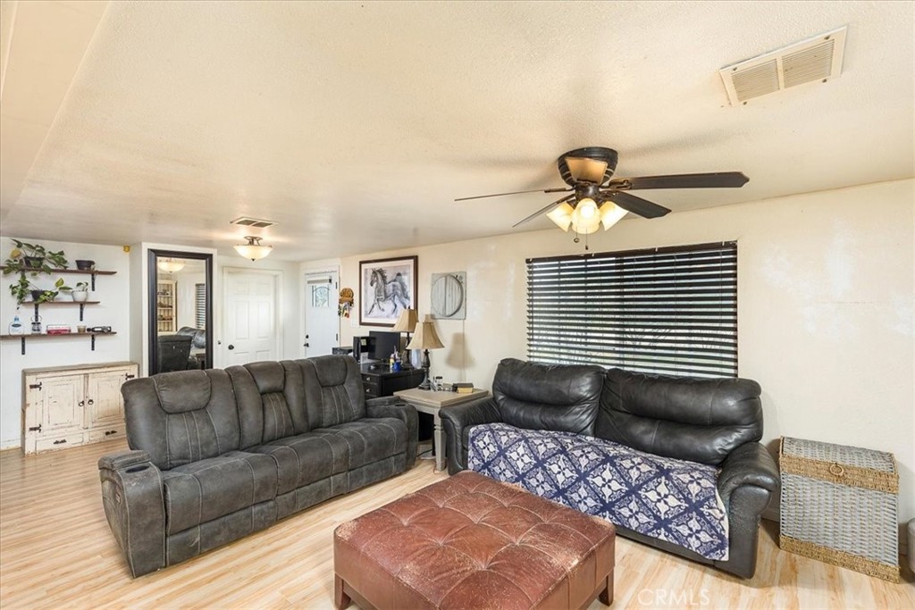44000 Sandstone Road Aguanga, CA 92536 - Photo 7 of 31 a living room with furniture and a window