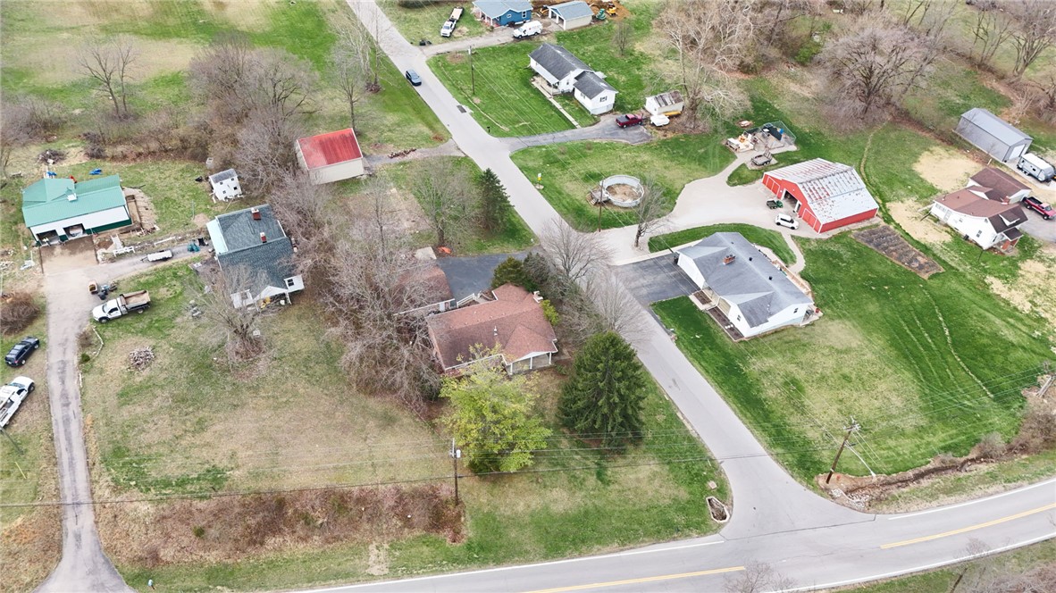 6711 Hamilton-Middletown Road Franklin, OH 45005 - Photo 39 of 49 This captivating aerial view showcases a vibrant community with expansive green spaces and diverse structures.