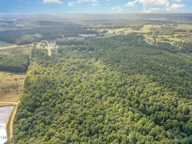 a view of a lake with beach and ocean view