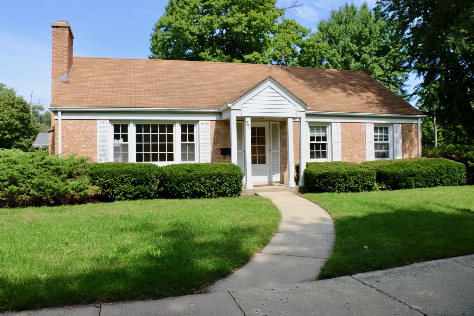 a view of a house with garden