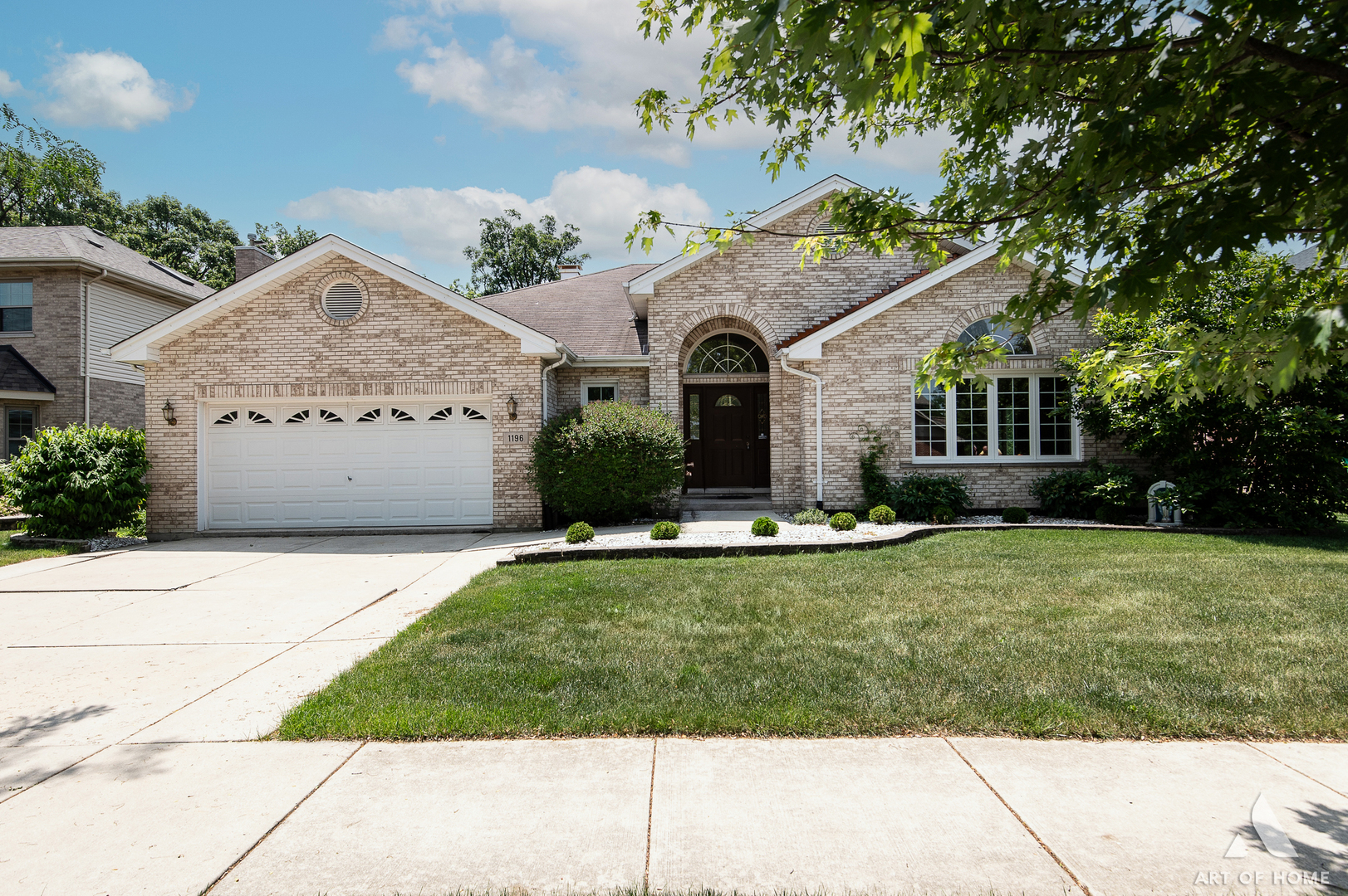 a front view of house with yard