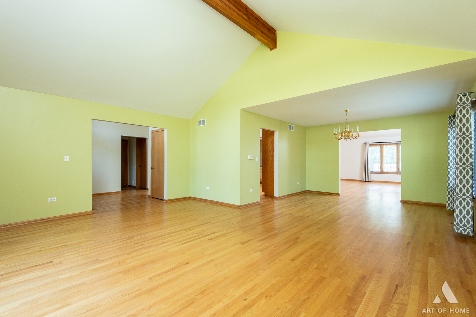 1196 Covington Drive Lemont, IL 60439 - Photo 18 of 52 a view of a big room with wooden floor and windows