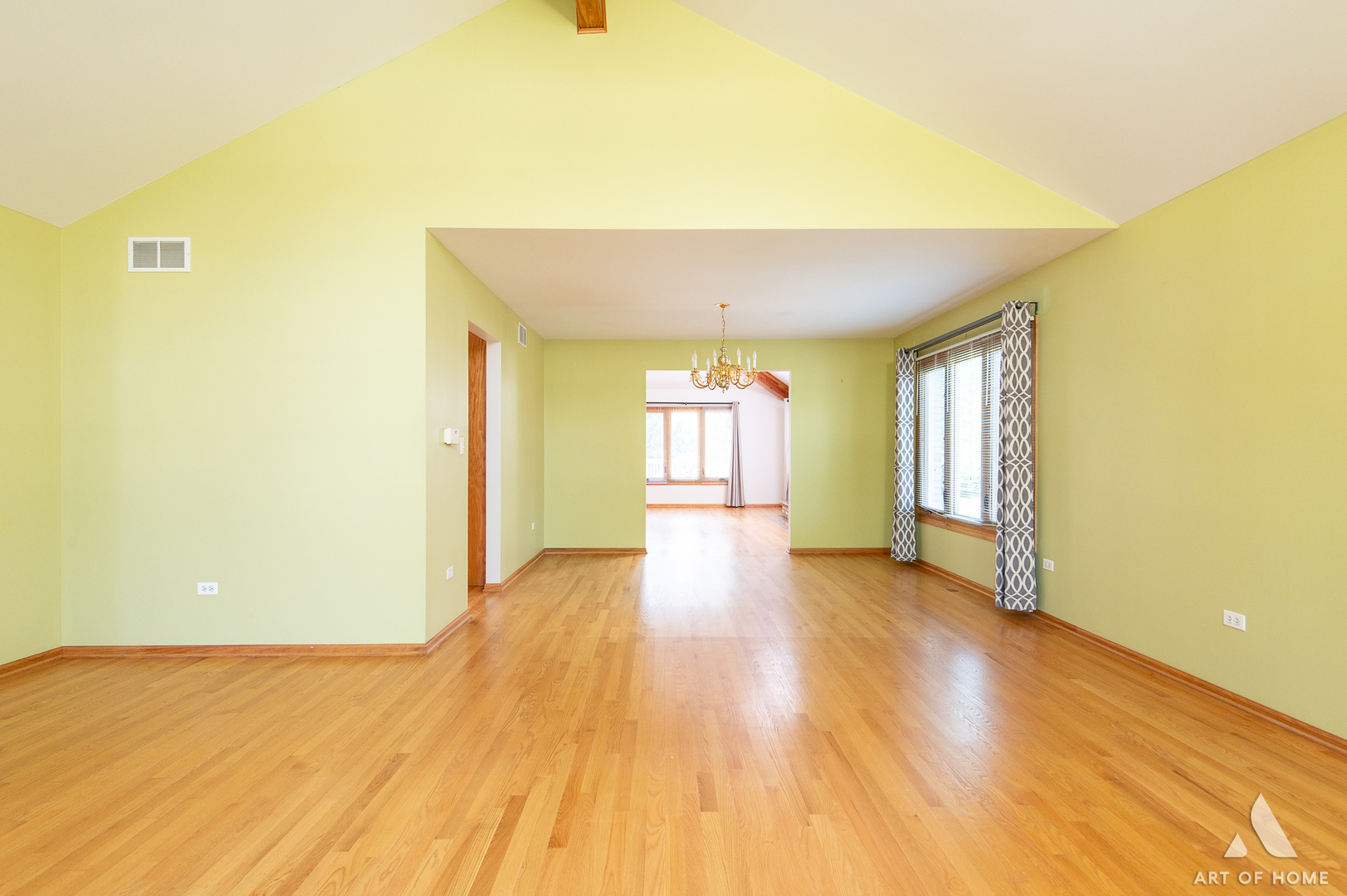 1196 Covington Drive Lemont, IL 60439 - Photo 19 of 52 a view of an empty room with wooden floor and a window