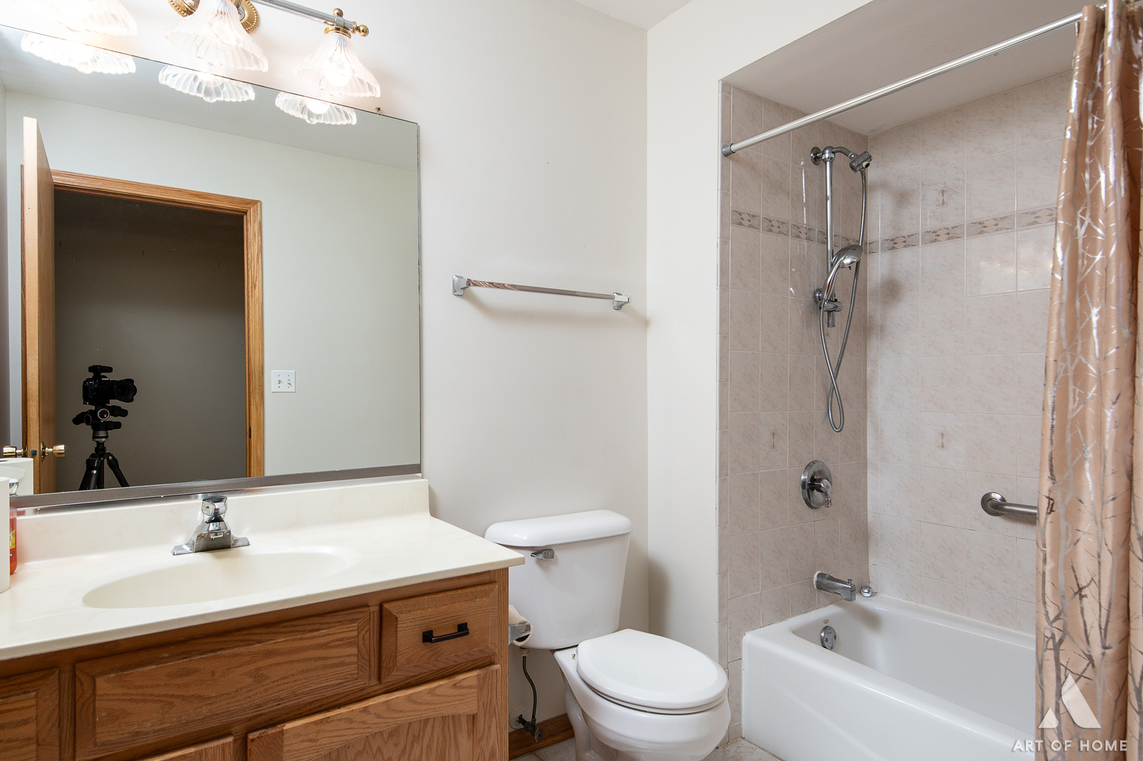 1196 Covington Drive Lemont, IL 60439 - Photo 23 of 52 a bathroom with a sink a toilet and shower