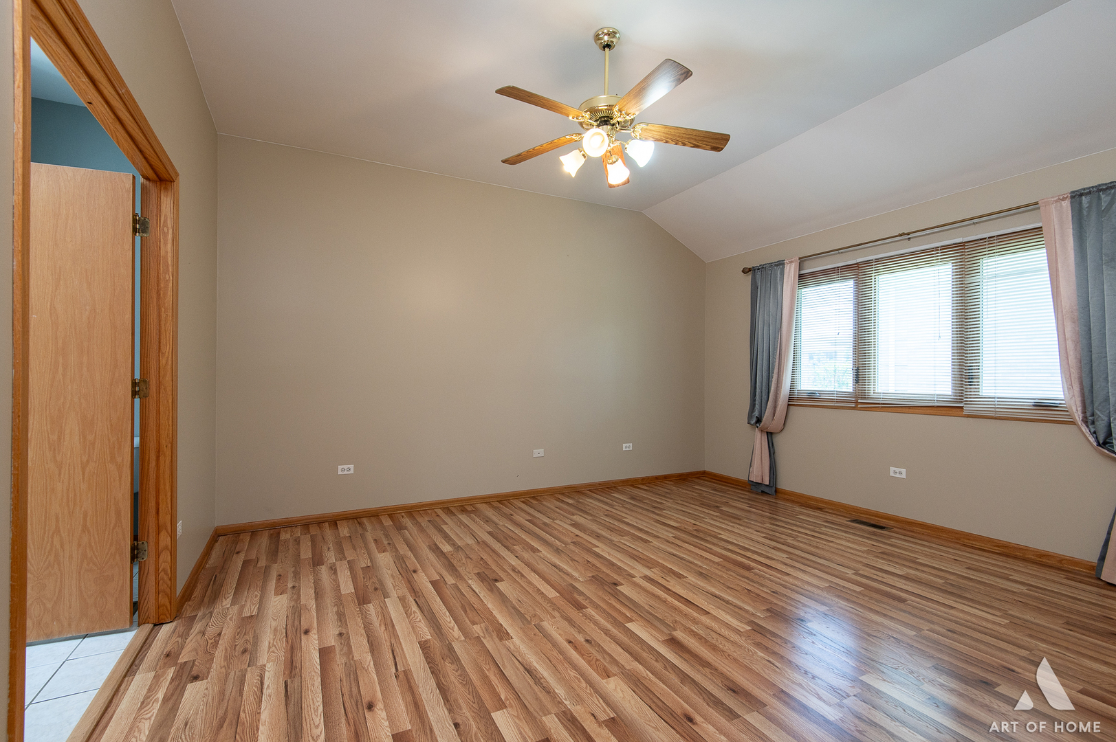1196 Covington Drive Lemont, IL 60439 - Photo 24 of 52 a view of an empty room with wooden floor and a window