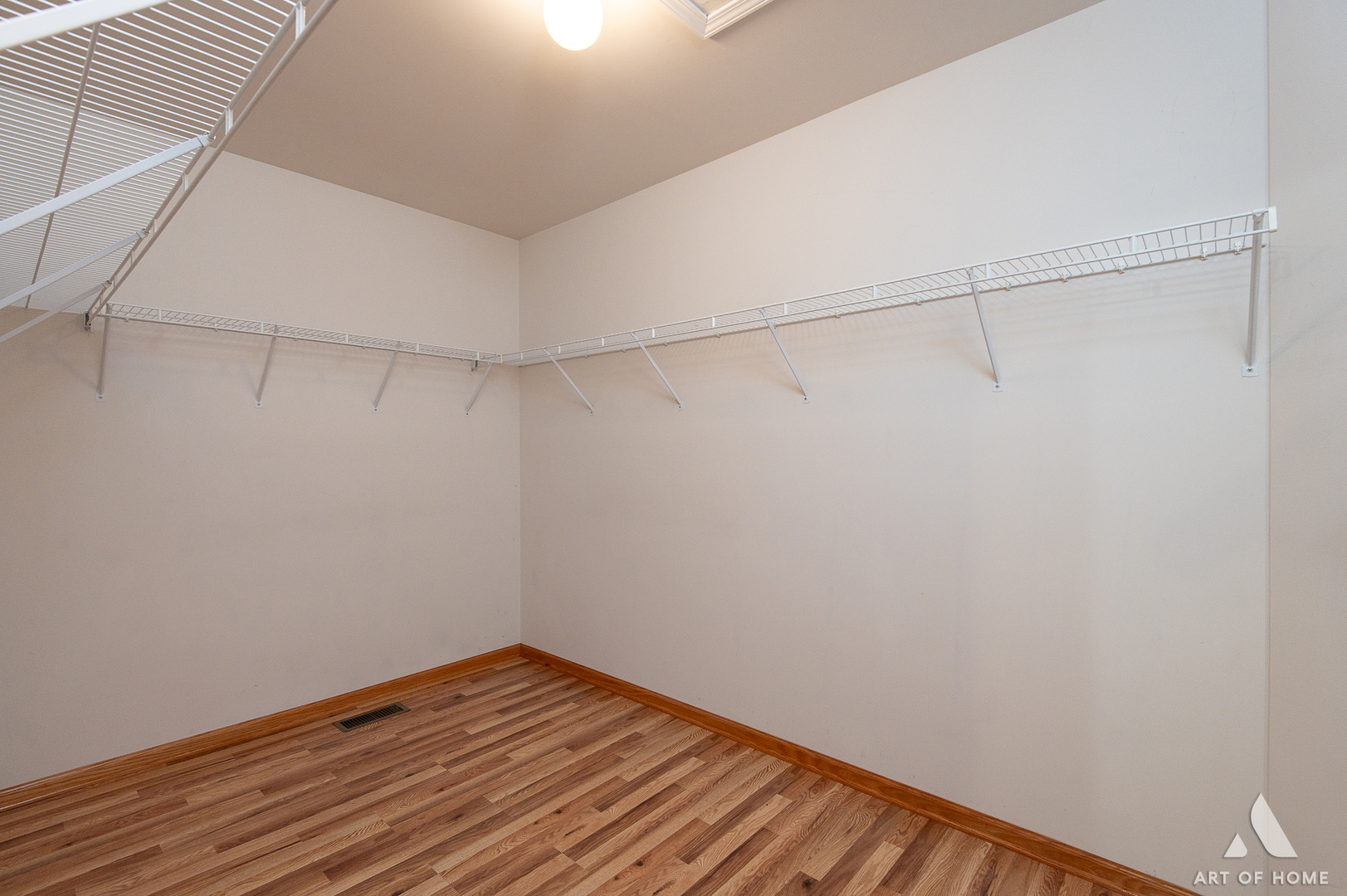 1196 Covington Drive Lemont, IL 60439 - Photo 28 of 52 a view of a room with wooden floor