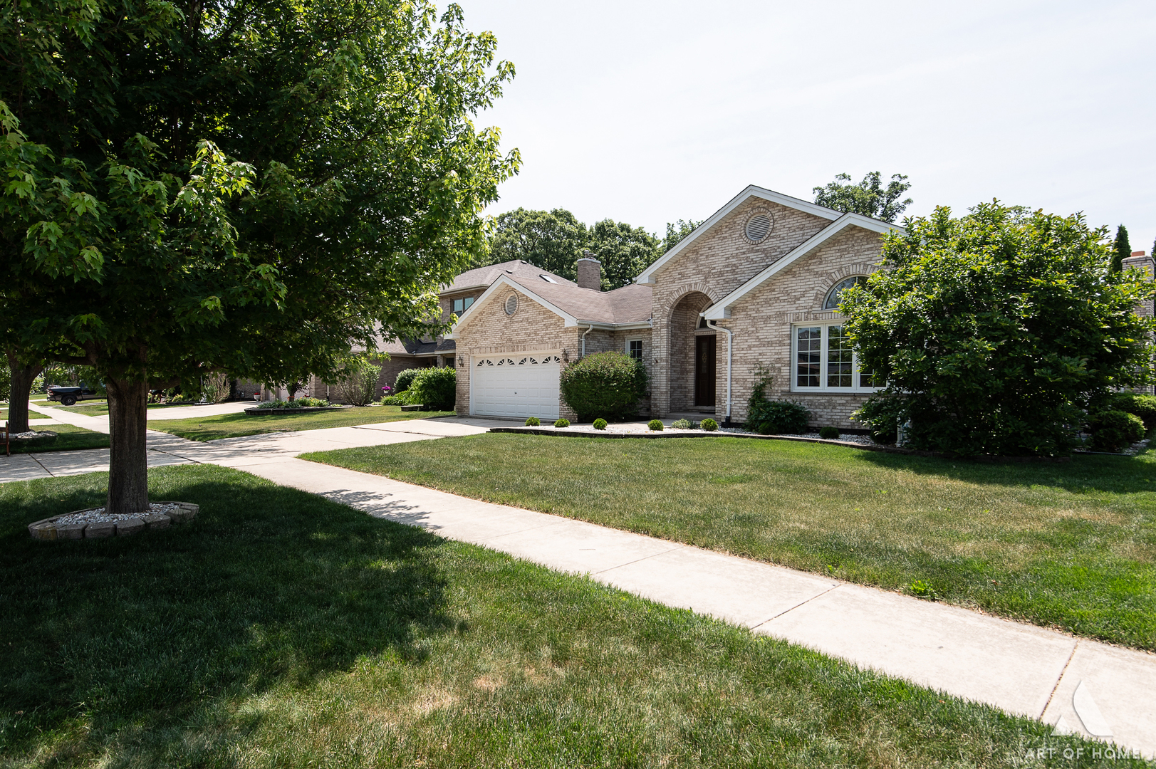 1196 Covington Drive Lemont, IL 60439 - Photo 3 of 52 a front view of a house with a yard