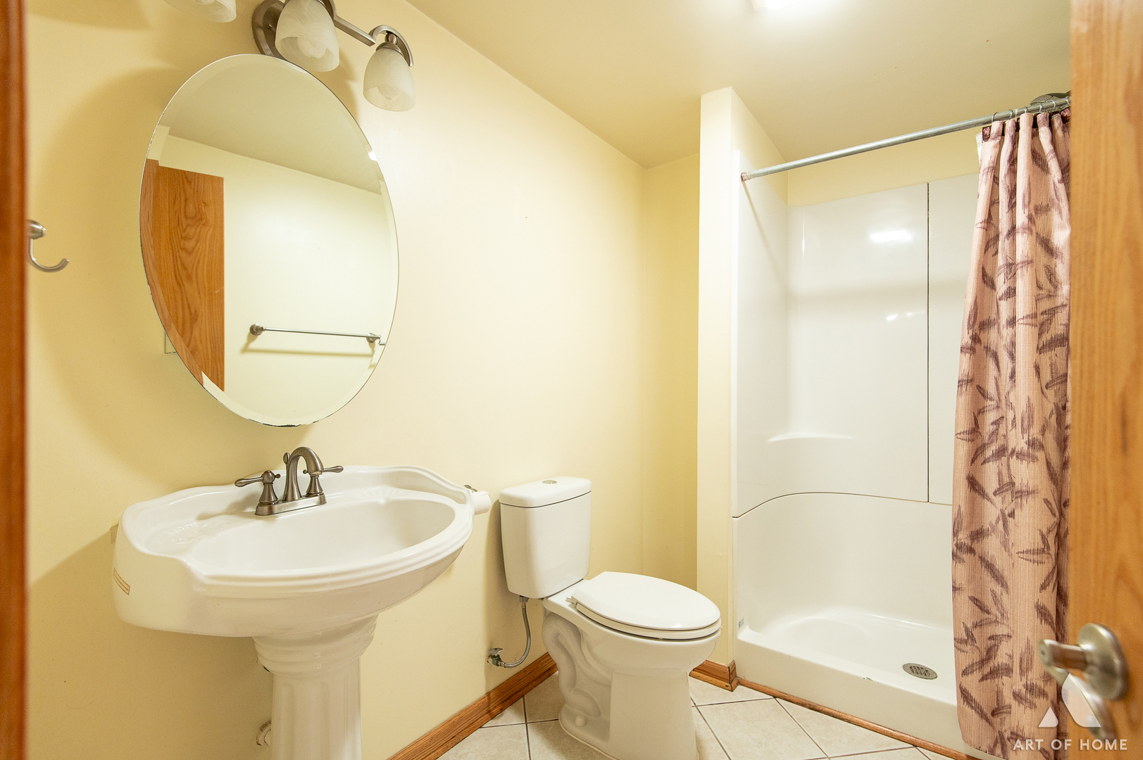 1196 Covington Drive Lemont, IL 60439 - Photo 36 of 52 a bathroom with a sink and a mirror