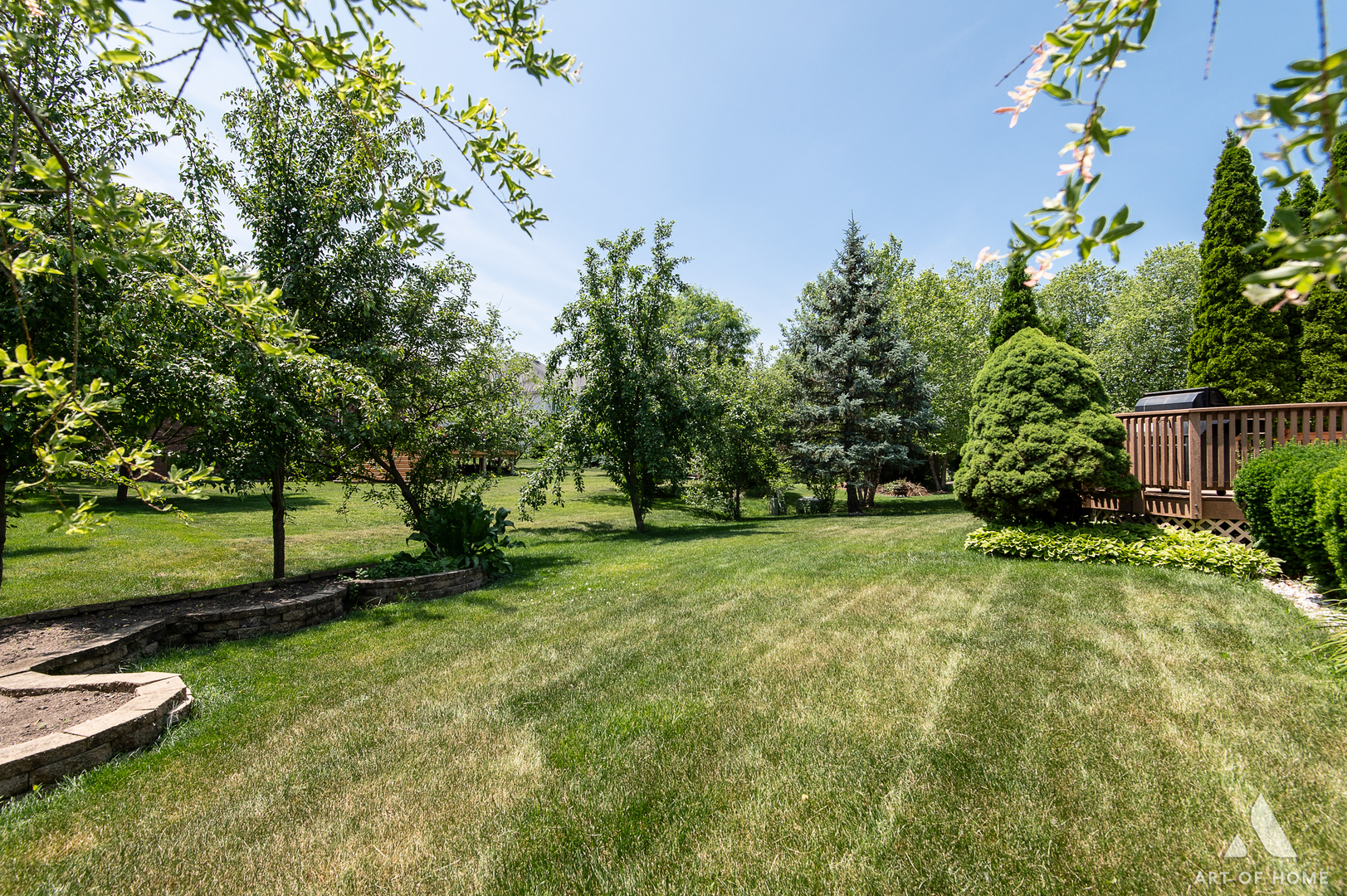 1196 Covington Drive Lemont, IL 60439 - Photo 49 of 52 a view of a backyard with large trees