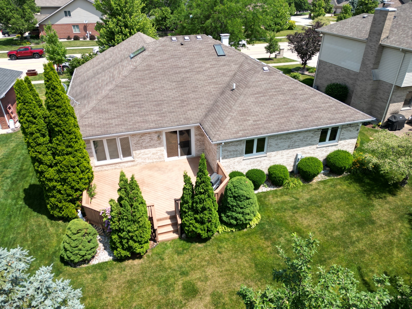 1196 Covington Drive Lemont, IL 60439 - Photo 51 of 52 an aerial view of a house with yard and greenery