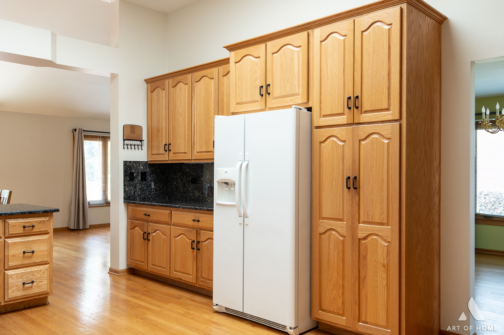 1196 Covington Drive Lemont, IL 60439 - Photo 7 of 52 a kitchen with stainless steel appliances a refrigerator and cabinets
