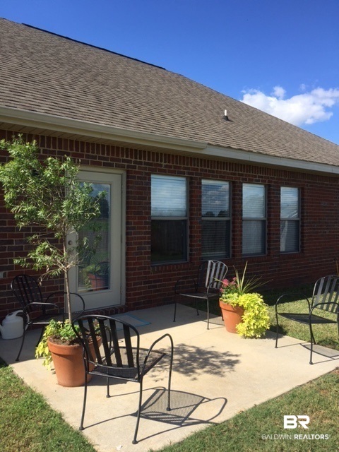 25336 Spindle Lane Daphne, AL 36526 - Photo 32 of 33 back porch