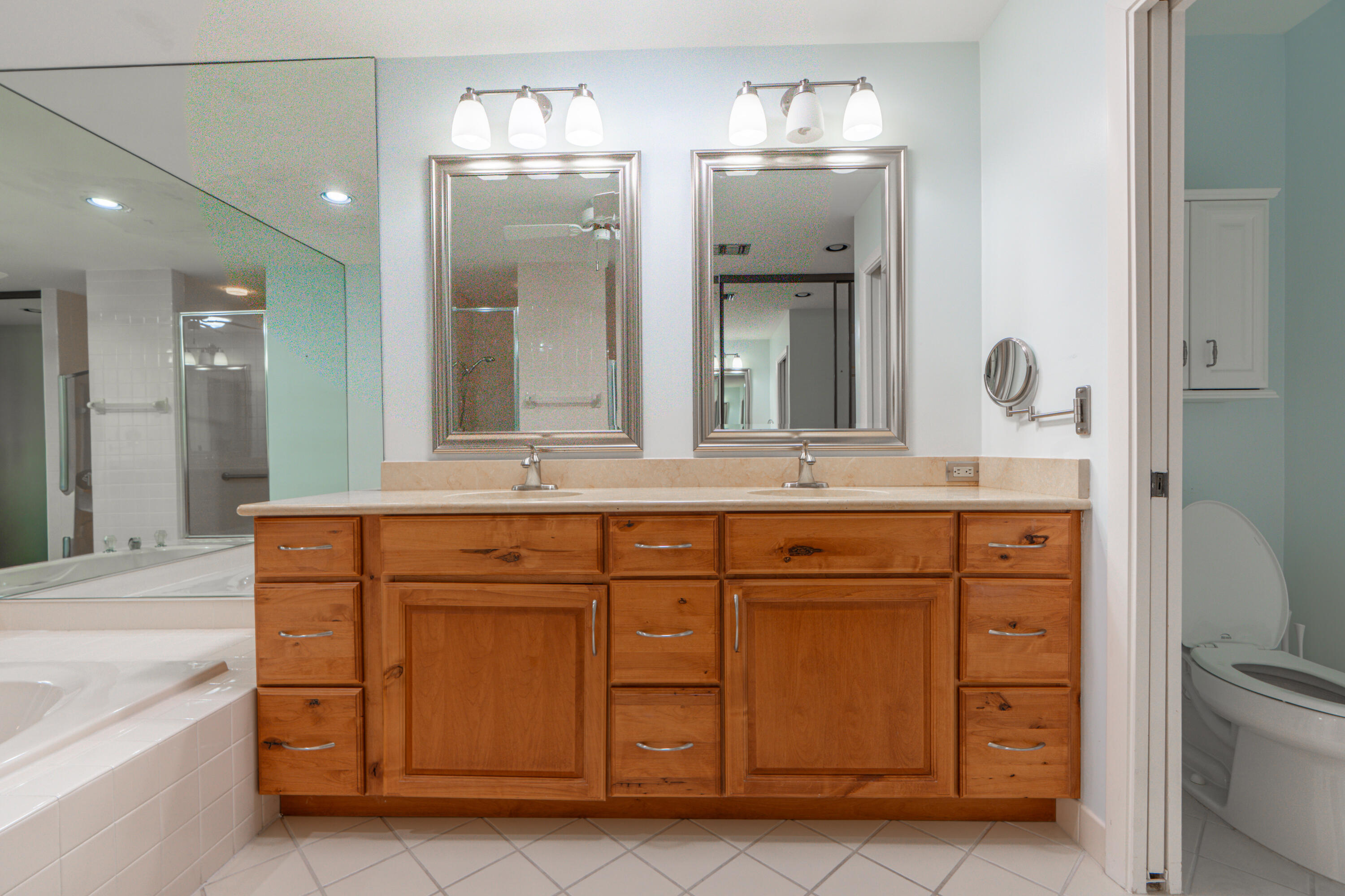 422 River Edge Road Jupiter, FL 33477 - Photo 28 of 39 a bathroom with a sink and a mirror