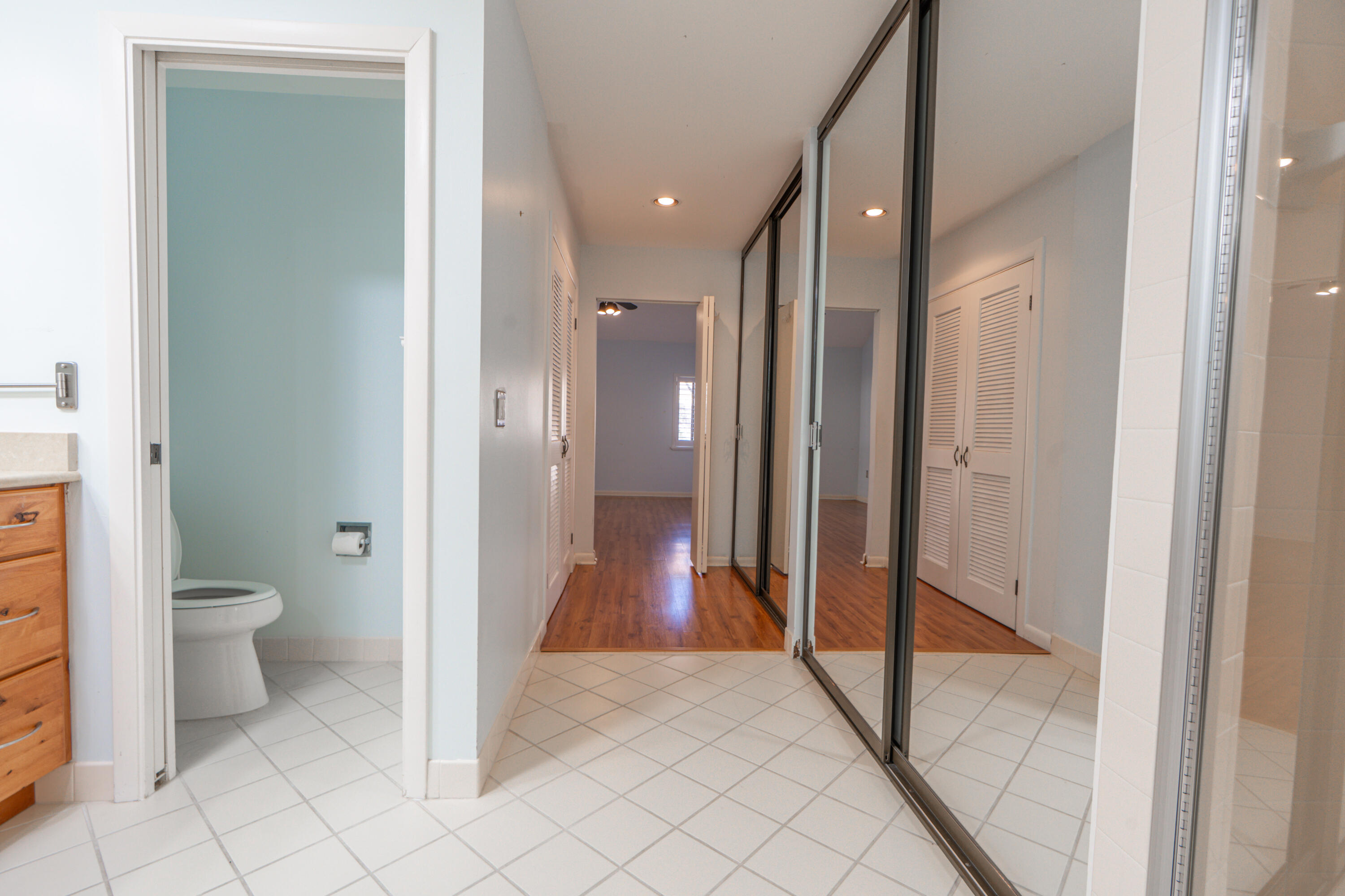 422 River Edge Road Jupiter, FL 33477 - Photo 30 of 39 a bathroom with a glass door shower