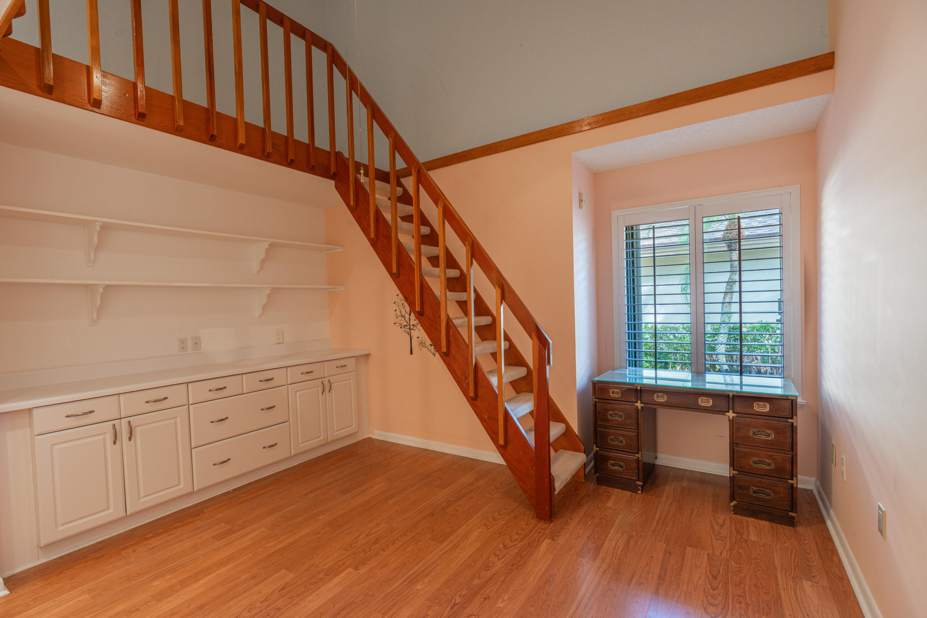 422 River Edge Road Jupiter, FL 33477 - Photo 34 of 39 a view of an entryway with wooden floor and stairs