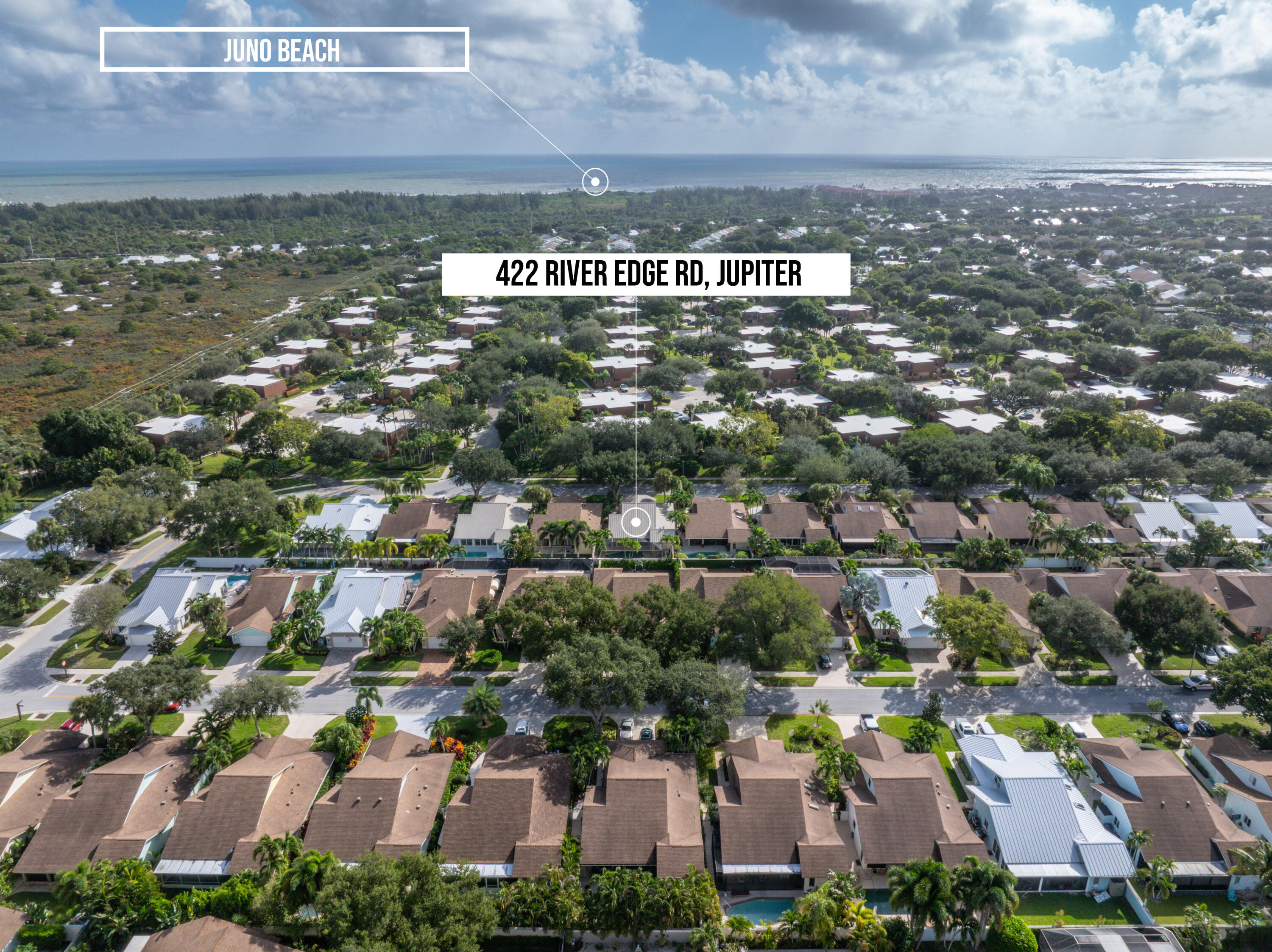 422 River Edge Road Jupiter, FL 33477 - Photo 5 of 39 an aerial view of residential building with parking and yard