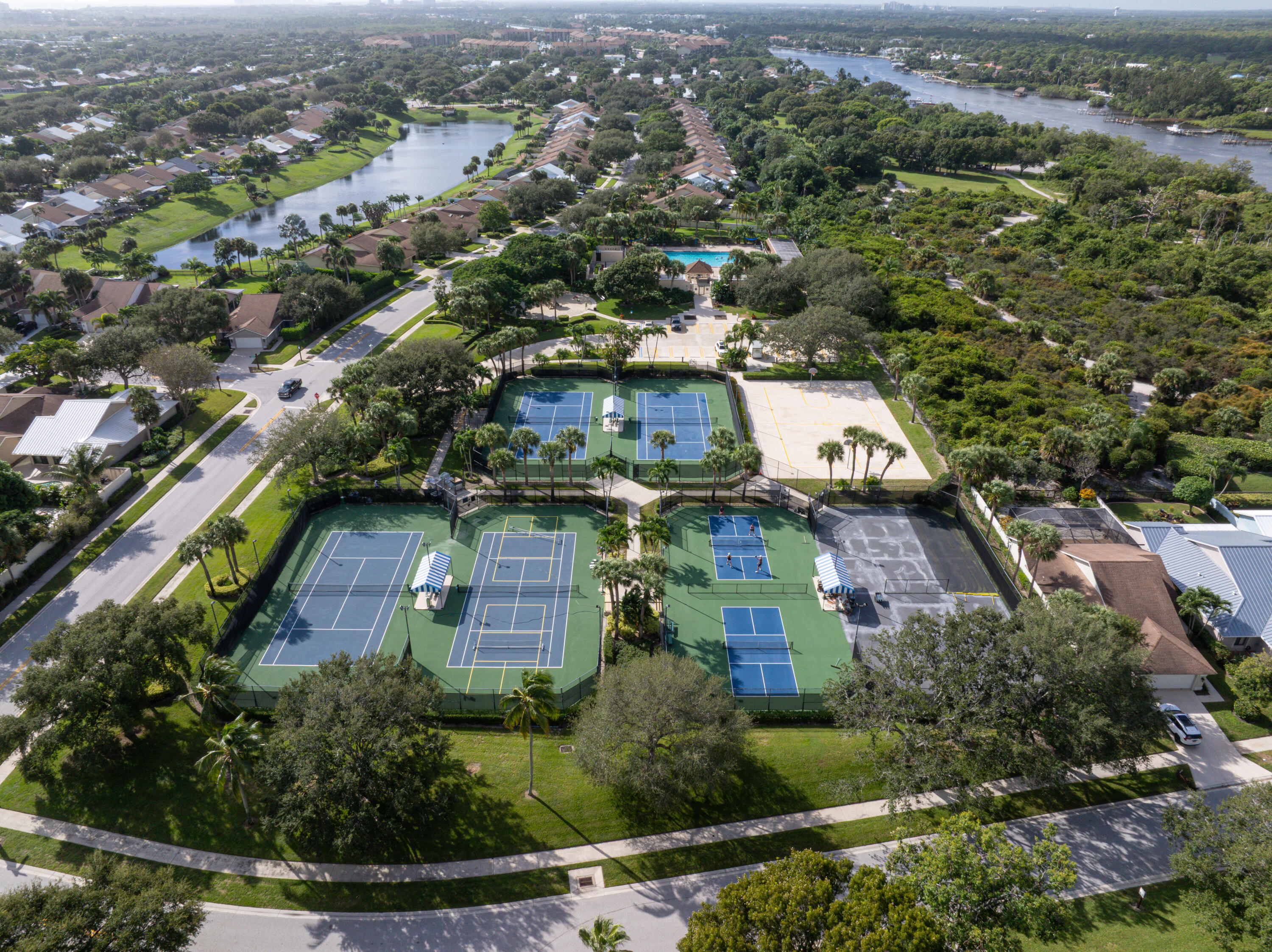 422 River Edge Road Jupiter, FL 33477 - Photo 8 of 39 an aerial view of residential houses with outdoor space