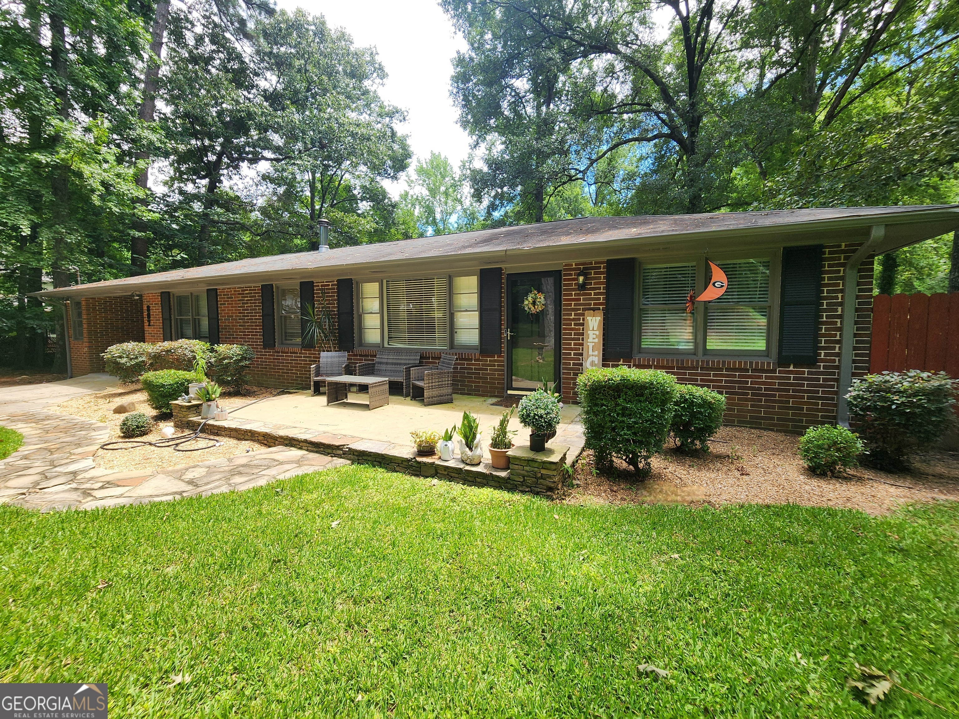 807 Wera Place Macon, GA 31210 - Photo 2 of 46 a view of a house with backyard and sitting area