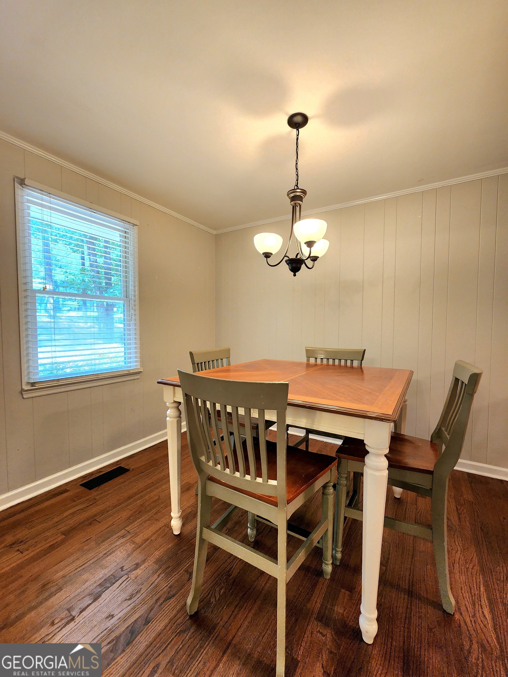807 Wera Place Macon, GA 31210 - Photo 5 of 46 a view of a dining room with furniture wooden floor and chandelier