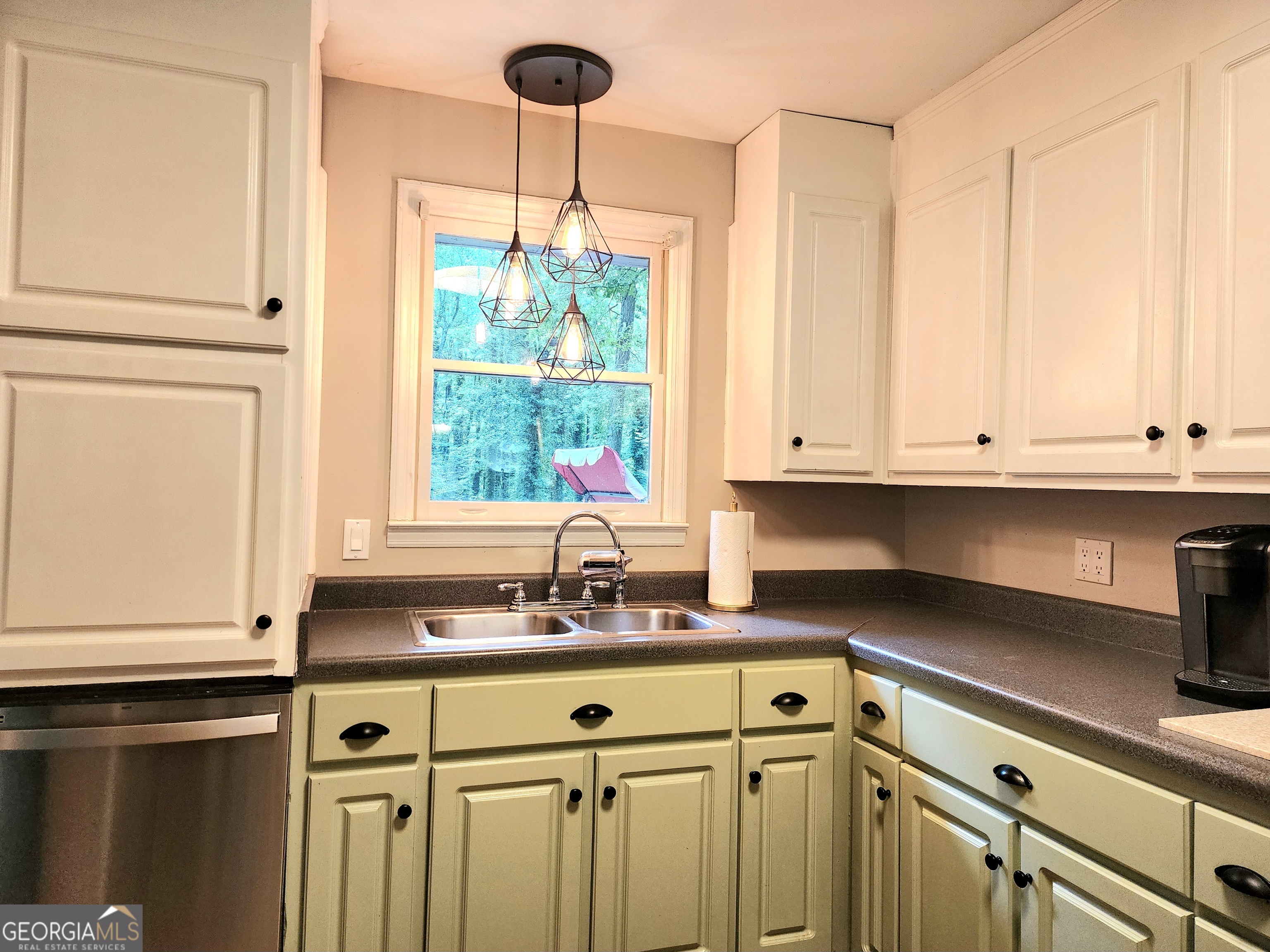 807 Wera Place Macon, GA 31210 - Photo 10 of 46 a kitchen with a sink and cabinets