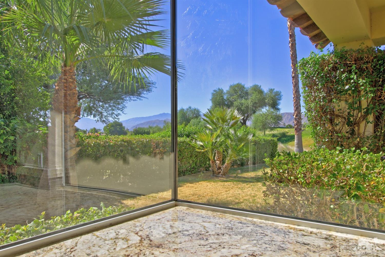 204 Loch Lomond Road Rancho Mirage, CA 92270 - Photo 16 of 45 a view of a window in a yard
